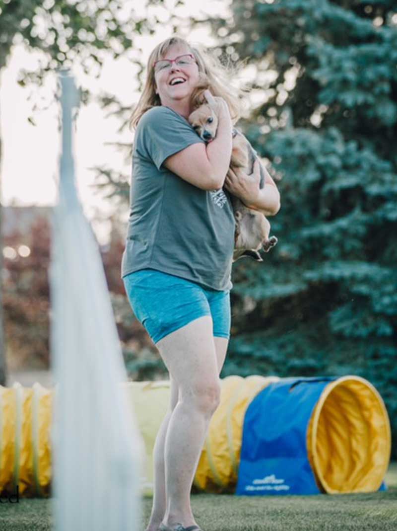 Bonnie with small dog at agility course